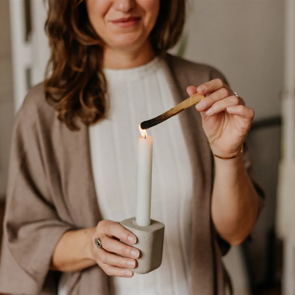 giusi lighting a candle
