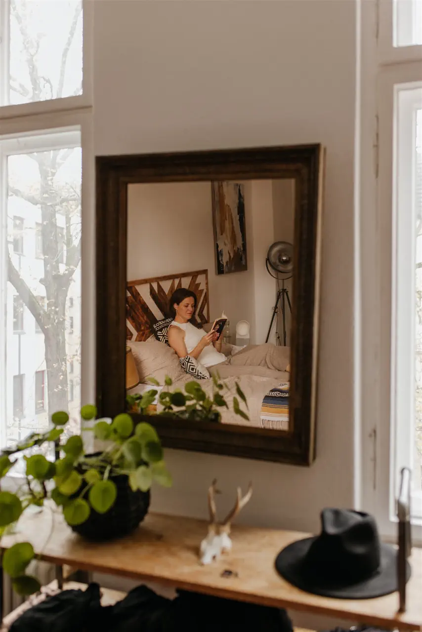 HDH by Giusi Valentini giusi with book in mirror